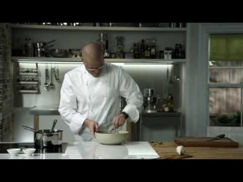 Chef preparing crushed Jersey Royals